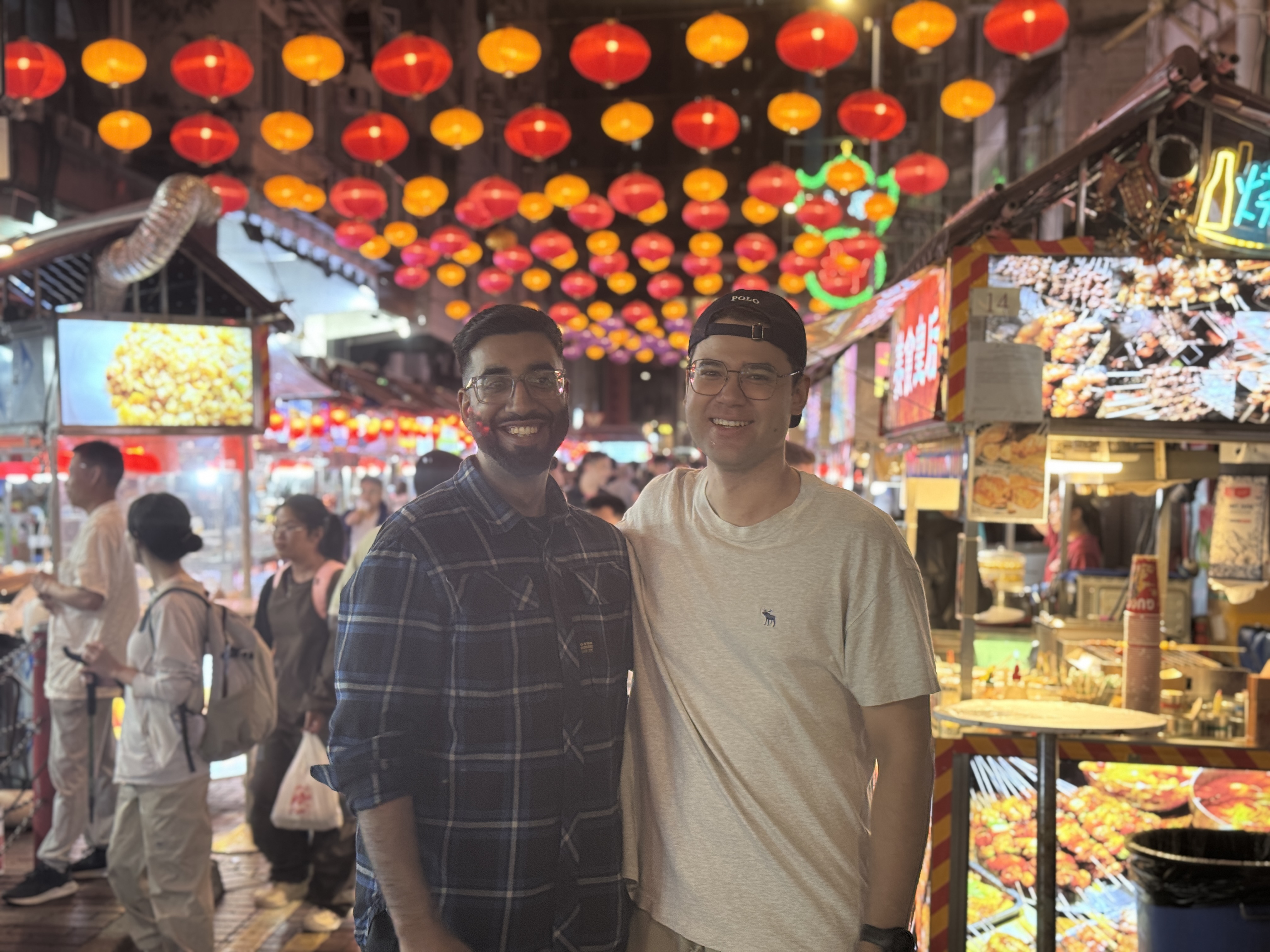 Daniel and Ananya at a night market